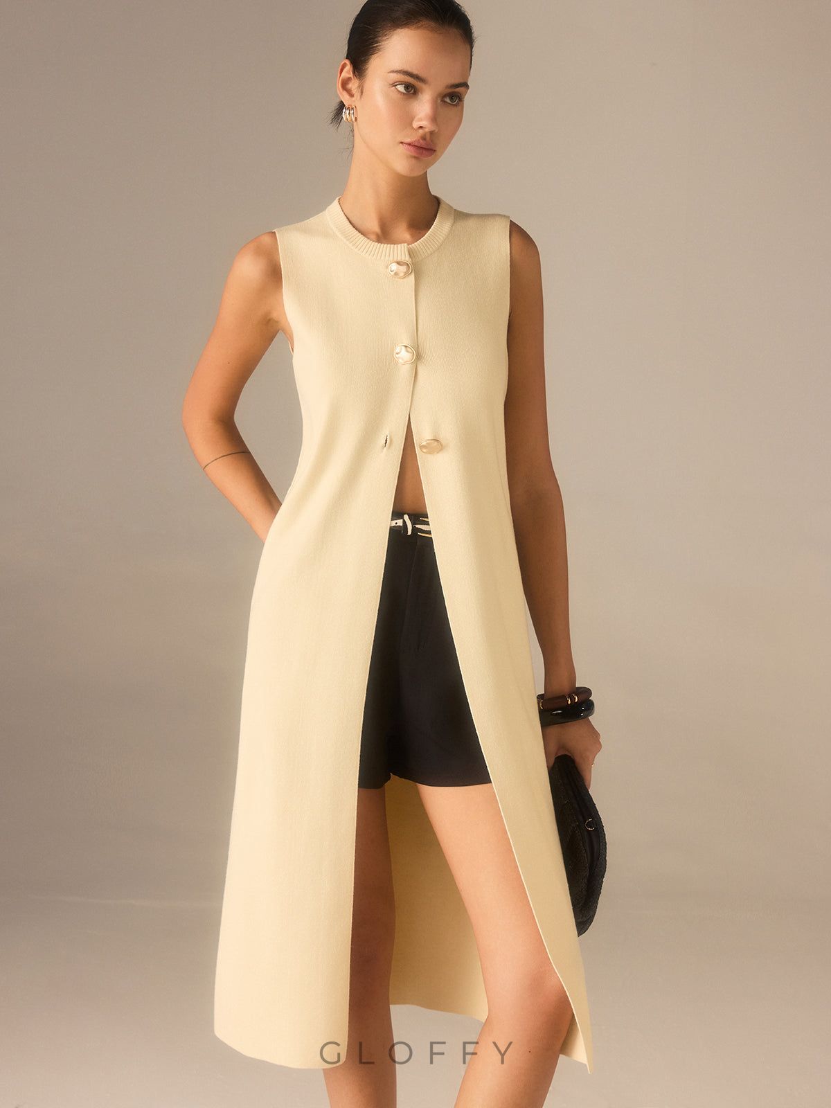 Kolsuz Uzun Düğmeli Triko Yelek – Krem