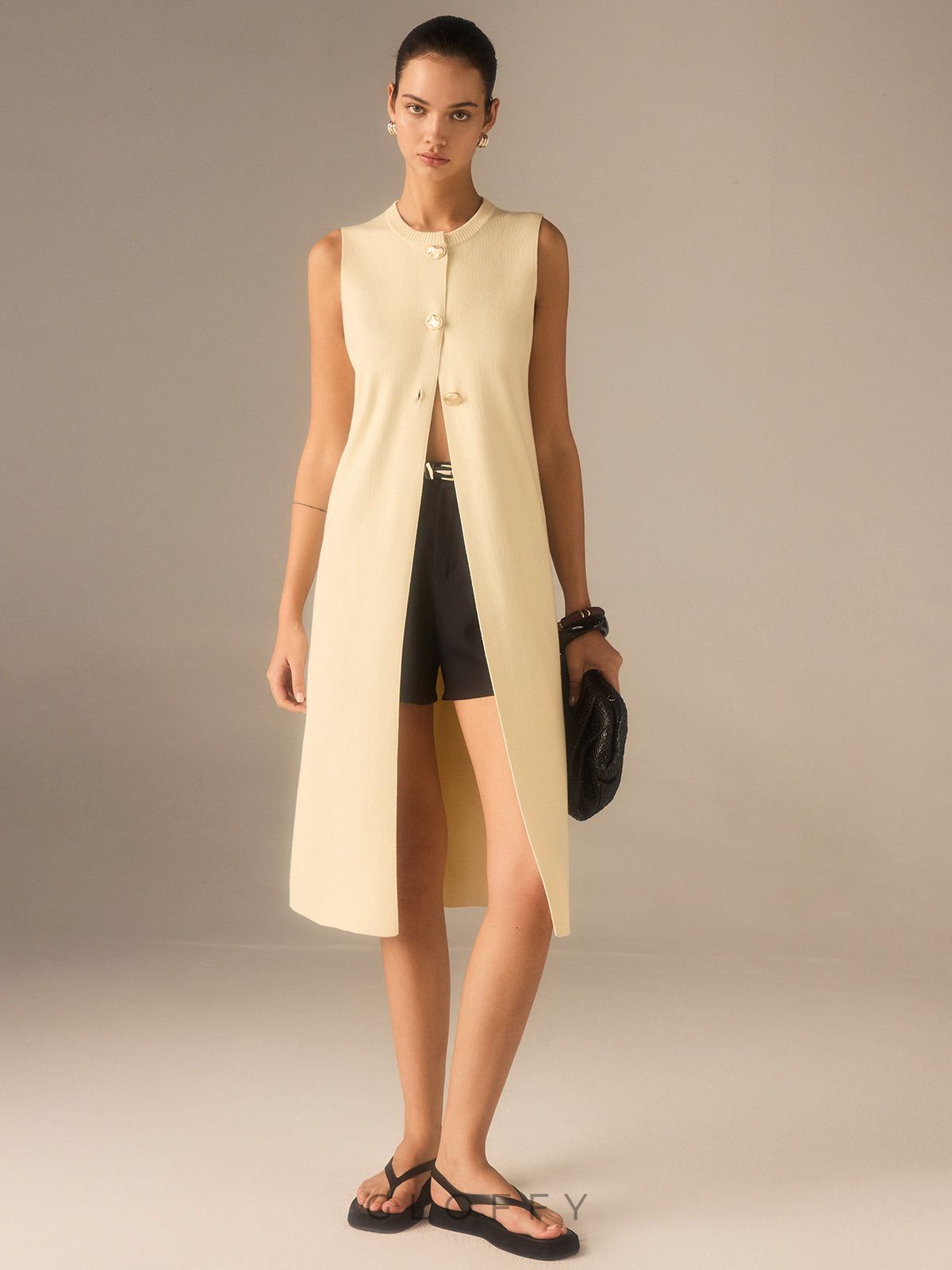 Kolsuz Uzun Düğmeli Triko Yelek – Krem